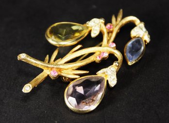 SIGNED 'BSK' GOLD TONE BROOCH RHINESTONES COLORED GLASS STONES FLORAL FORM