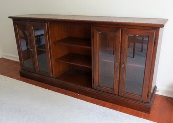 A Side Board Buffet With Locking End Cabinets