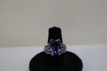 925 Sterling Silver With 14K Yellow Gold Embelishment Around Blue Stones Large Purple Center Stone Ring Size 6