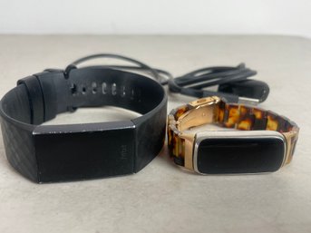 Pair Of Fitbits