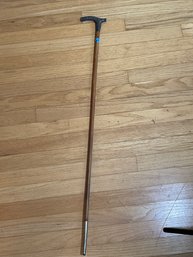 A STERLING SILVER WALKING STICK