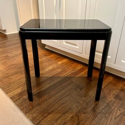 A Small Black Occasional Table