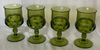 Four Green Pressed Glass Goblets