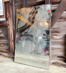 A Vintage Beveled Mirror, Mounted