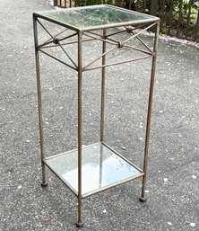 A Vintage Wroght Iron Side Table With Glass Shelf And Top