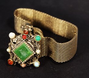 VITNAGE COSTUME GOLD TONE SLIDE BRACELET HAVING INTAGLIO GLASS STONE & TASSEL