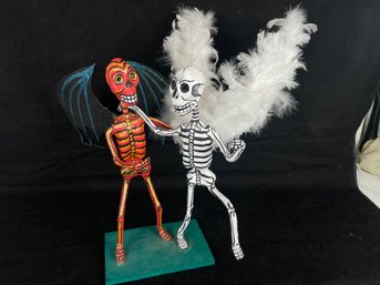 Devil And Angel Dance Together On The Day Of The Dead