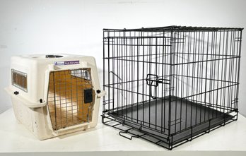 A Cat Carrier And A Dog Crate