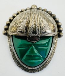 VINTAGE STERLING SILVER AND CARVED GREEN STONE WARRIOR BROOCH MEXICO
