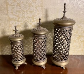 Three Middle Eastern Cylindrical Brass Candle Holders