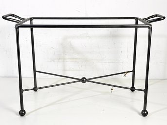 A Raised Metal Stand For Catering Platters