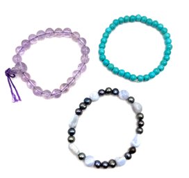 Lot Of Stretchy Bracelets Having Turquoise Color And Purple Colors