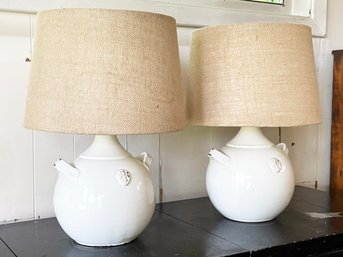 A Pair Of Glazed Ceramic Lamps With Linen Shades