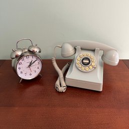 Vintage Style Bell Alarm Clock And White Desk Phone