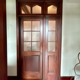 A Bathroom Door Entrance With Detailed Transom And Window - Primary Bath B