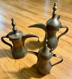 Three Vintage Middle Eastern Brass Jugs