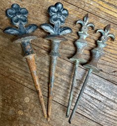 Two Sets Of Decorative Metal Garden Stakes