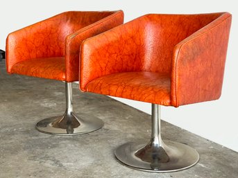 A Pair Of Vintage Mid Century Modern Swivel Barrel Chairs In Chrome And Vinyl After Walter Knoll