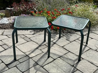 A Pair Of Outdoor Side Tables With Textured Glass Tops