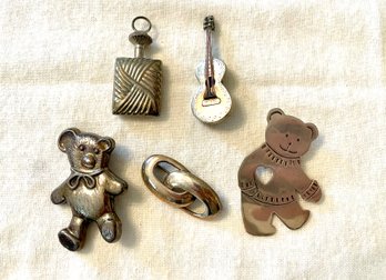 Five Sterling Pins & Pendants Including Teddy Bear & Guitar