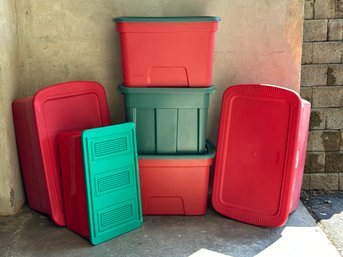 A Grouping Of Storage Bins In Red & Green