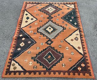 A Wool Area Rug In Navajo Style