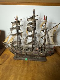 A WOODEN SHIP MODEL