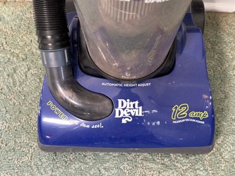 A Bagless Dirt Devil 12-Amp Upright Vacuum