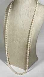 Fine Strand Of Pearls 30' Long Having 14K Gold Clasp