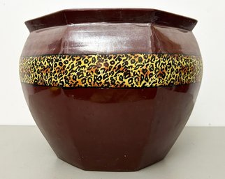 A Ceramic Planter Or Cache Pot With Animal Print Applique