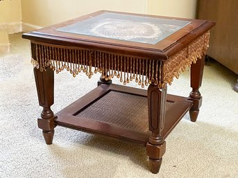 A Glass Top Side Table With Beaded Applique