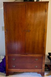 Simple Wooden Armoire With Bottom Drawers