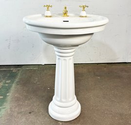 A Vintage Kohler Pedestal Sink With Brass Fittings