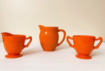 Bright Orange Glass Creamers And Sugar Bowl-Set Of Glass Bake And Largeer Hazel Atlas