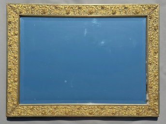 An Antique Gilt And Plaster Framed Mirror