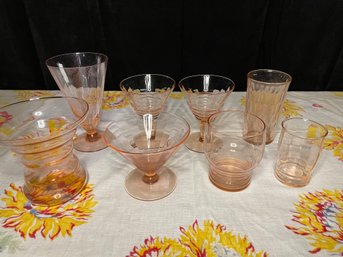An Assorted Lot Of Pink Depression Glass Drinkware