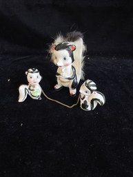 Skunk Figurines