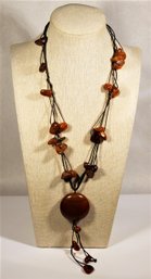 Carnelian Stone Beaded Necklace Having Round Medallion Pendant