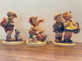 Three Vintage 1950' Hummel Figures.  5.5' Tall (5)