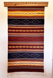 A Vintage Navajo Wall Hanging With Pine Mounting Bracket