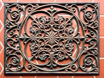 A Vintage Cast Iron Doormat