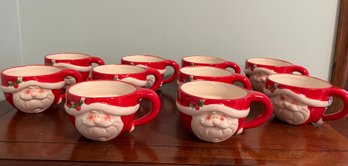 Ten Santa Claus Mugs With Storage Tin