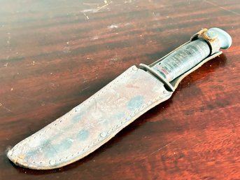 A Vintage Knife In Leather Sheathe