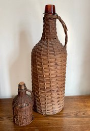 Two Early Wicker Covered Bottles Or Demijohns.