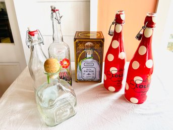 Group Of Bottles And A Tin