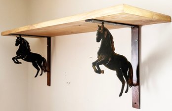 A Pair Of Equestrian Shelf Brackets