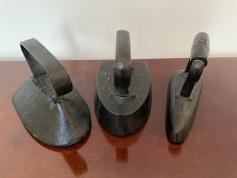 Trio Of Antique ,black Painted Irons.