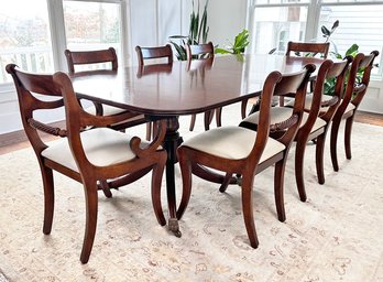 A Magnificent English Regency Dining Table In Flame Mahogany And A Set Of 12 Chairs, Purchase Price $13,000
