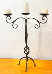 A Wrought Iron Candelabrum