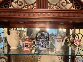 Set Of Four Tea Pots & Porcelain Floral Decor